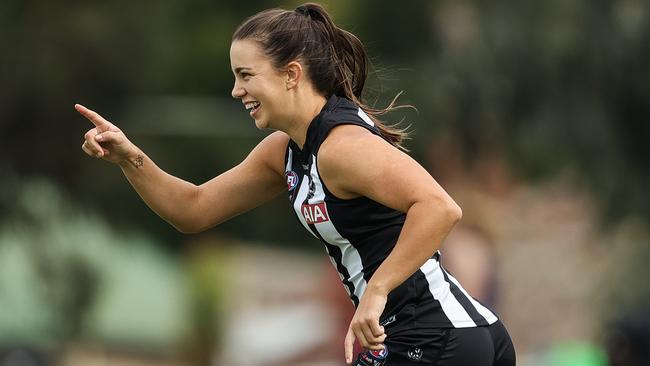 MELBOURNE, AUSTRALIA - MARCH 20: Chloe Molloy of the Magpies celebrates a goal during the round eight AFLW match between the Collingwood Magpies and the St Kilda Saints at Victoria Park on March 20, 2021 in Melbourne, Australia. (Photo by Martin Keep/AFL Photos/via Getty Images )