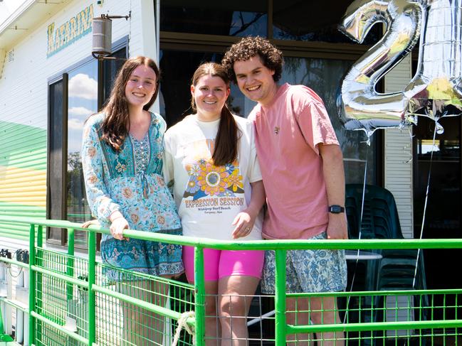 Trinity Williams, 21, from Waikerie with best friends Alicia Shaw, 22, and Brendan Wilson, 26, from Mount Barker on a Green and Gold Houseboat to celebrate TrinityÃ¢â¬â¢s 21st birthday at the Murray riverbank in Waikerie, South Australia. Friday, November 11, 2022. (The Advertiser/ Morgan Sette)