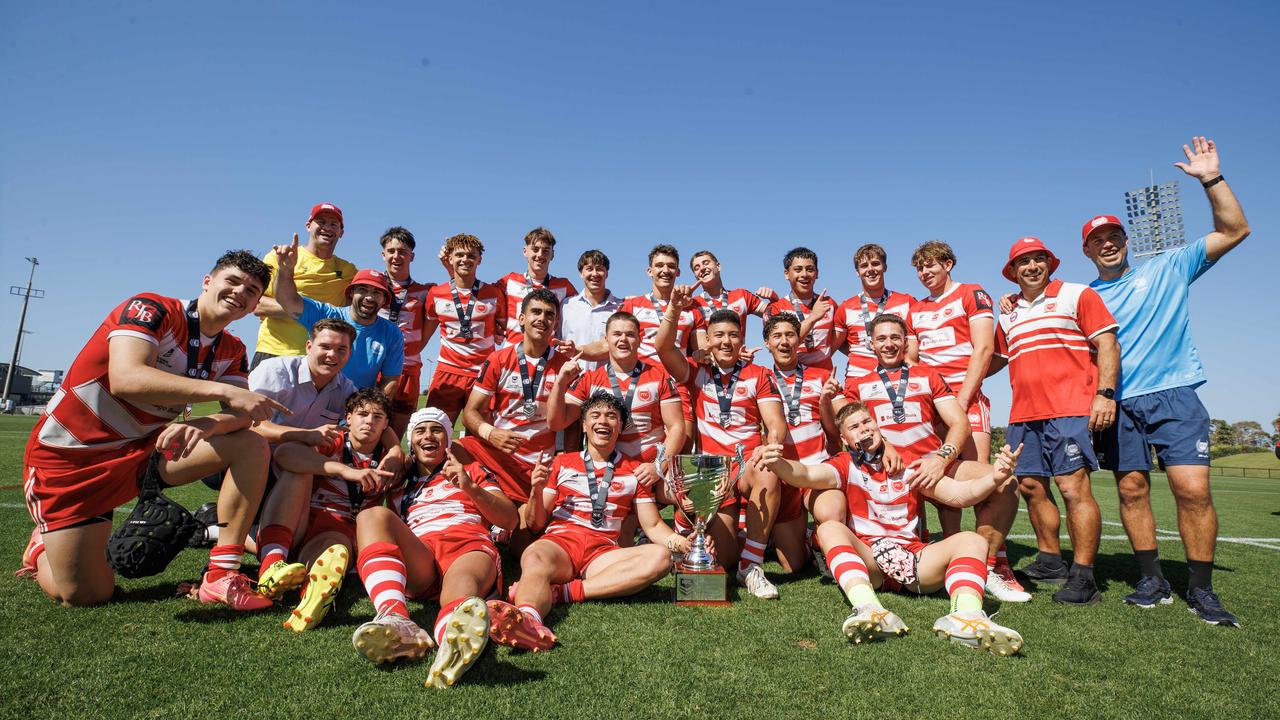 Palm Beach Currumbin celebrate winning the NRL Schoolboy Cup grand final against Kirwan SHS at Bokarina. Picture Lachie Millard