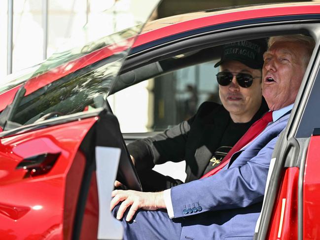 US President Donald Trump reportedly wants to get rid of the Tesla he bought in a show of support for Musk. Picture: AFP