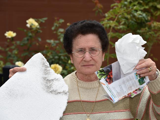 Ann Del Borrello, 73, with rubbish outside her Craigieburn home on January 17. Picture: Andrew Batsch