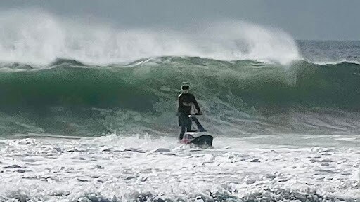 A wave rider on the unpatrolled beach near Mudjimba. Picture: Mark Furler