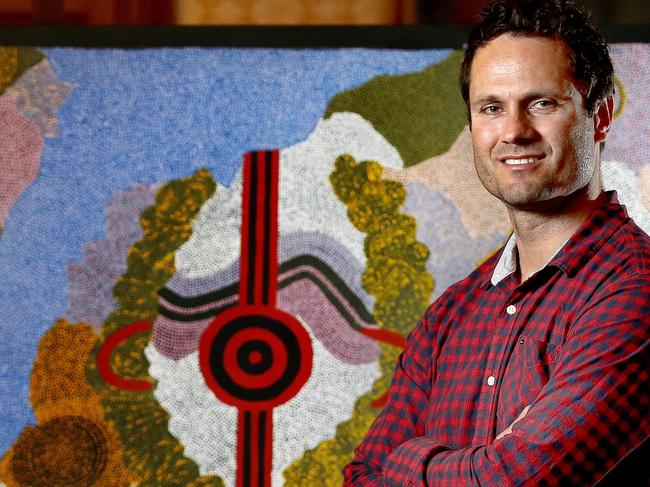 2/11/15 - Gavin Wanganeen with his painting 'Camping At Point Pearce' that will be displayed at the Adelaide Town Hall as part of the opening to the Reconciliation Room - pic Mike Burton