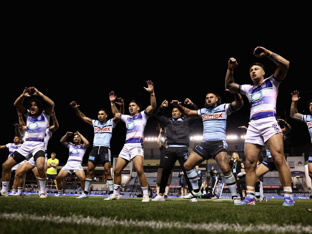 Warriors and Sharks players perform a Haka for Shaun Johnson after his final game. Picture: Cameron Spencer/Getty Images