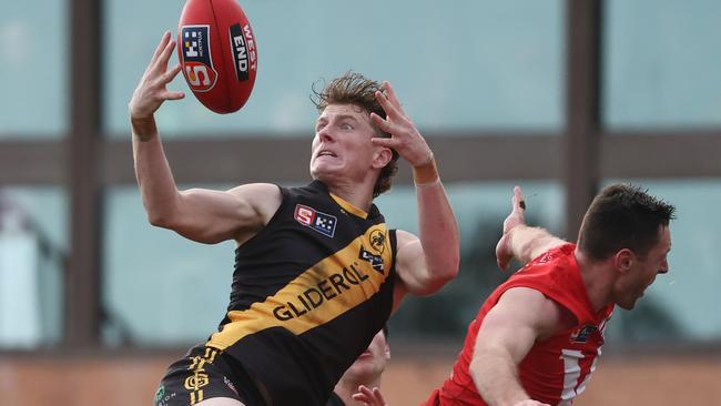 Lachie Hosie juggles a one-handed mark against North Adelaide at Prospect Oval in Round 15. Picture: David Mariuz/SANFL