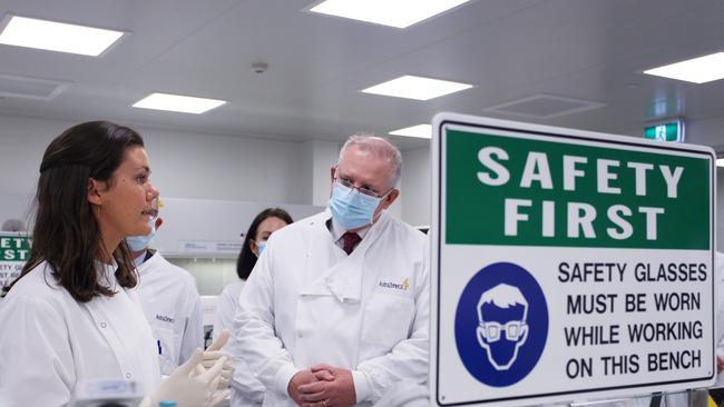 Prime Minister Scott Morrison meets with Savannah Alegre, a specialist at the microbiology laboratory at AstraZeneca in Sydney last year. Picture: Getty Images