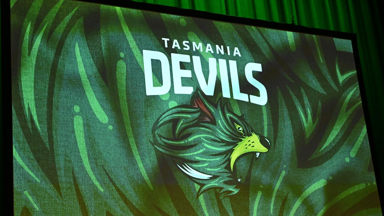 VARIOUS CITIES, AUSTRALIA - MARCH 18: The Tasmania Devils logo is unveiled during a media opportunity announcing the details for the Tasmanian AFL team, at Hobart Theatre Royal on March 18, 2024 in Various Cities, Australia. (Photo by Steve Bell/Getty Images)