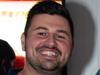 Man charged with horror hammer attack on motorsport identity