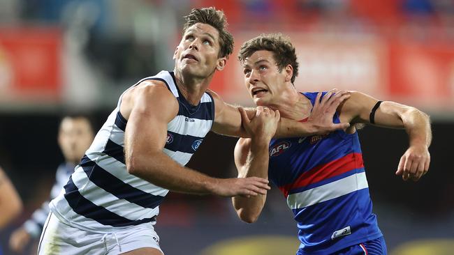 Geelong’s Tom Hawkins, left, managed two goals against the Bulldogs and remains favourite, but not yet a certainty, for the Coleman Medal. Picture: Getty Images