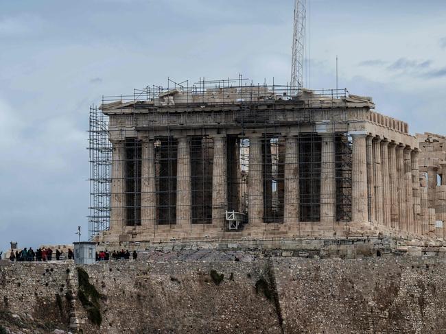 The sculptures were taken from the Parthenon Temple at the top of the Acropolis hill in Athens. Picture: Angelos Tzortzinis / AFP