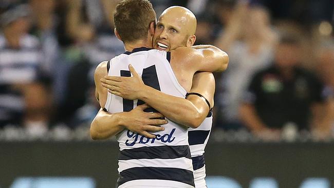 Gary Ablett and Joel Selwood celebrate the final siren. Pic: Michael Klein.