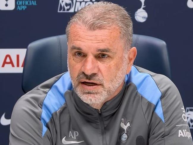Ange Postecoglou speaks to reporters.
