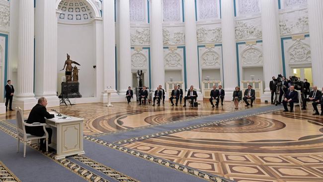 Vladimir Putin chairs a meeting with members of the Security Council in Moscow. Picture: AFP