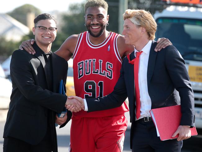 Brandan Parfitt, Esava Ratugolea and Scott Selwood dressed as Kim Jong Un, Dennis Rodman and Donald Trump. Picture: Alison Wynd