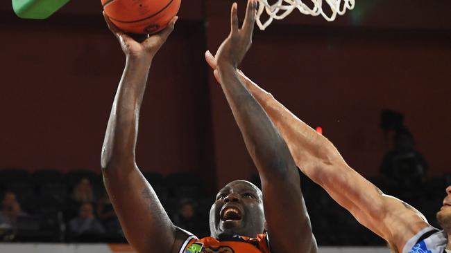 Nate Jawai of the Taipans shoots during the Round 4 NBL match between the Cairns Taipans and Melbourne United at the Cairns Convention Centre in Cairns, Saturday, November 3, 2018. (AAP Image/Brian Cassey) NO ARCHIVING, EDITORIAL USE ONLY