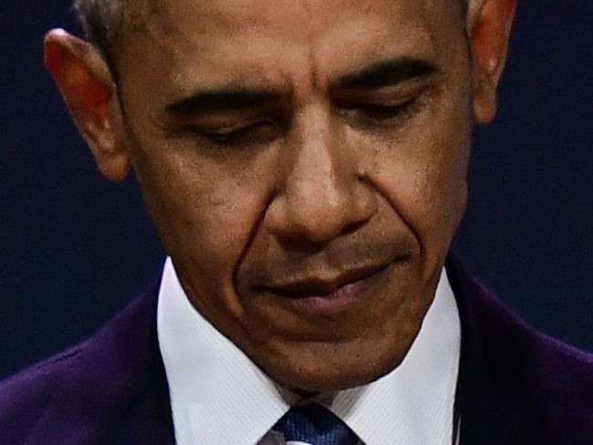 (FILES) In this file photo taken on December 2, 2017 former US President Barack Obama gestures as he speaks at an innovative communications conference organised by Les Napoleons network group, where he appears as a guest of honour, in Paris. Former president Barack Obama announced his support August 1, 2018 for several dozen Democratic candidates for Congress and state office, signalling he is "eager" to remain a political force through November's midterm elections. Amid obvious signs that President Donald Trump will hit the campaign trail for Republicans over the coming months, the nation's first African-American commander in chief is making it clear he too will campaign for several candidates ahead of the most anticipated midterm vote in years. / AFP PHOTO / Martin BUREAU