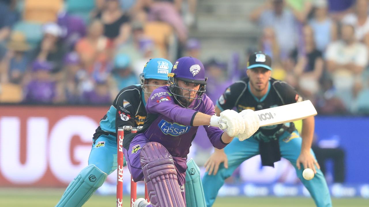 Caleb Jewell of the Hurricanes (centre) bats during the Big Bash League (BBL) match between the Hobart Hurricanes and the Brisbane Heat in January. Picture: AAP
