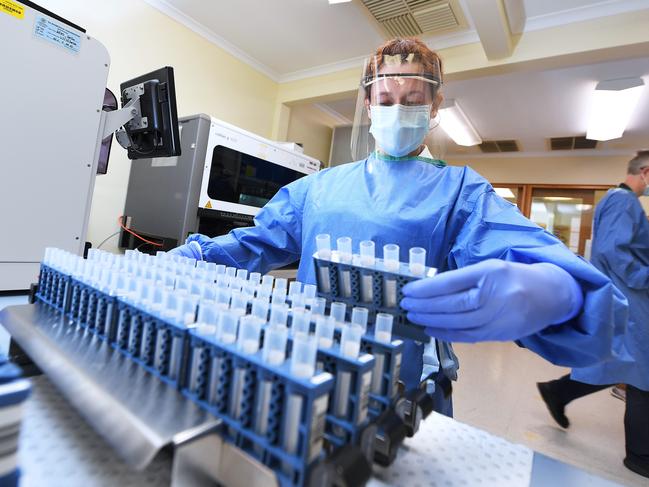 Medical scientist Belinda Price prepares vials for Coronavirus test samples at SA Pathology laboratory on Frome road Adelaide Wednesday April 22,2020.Picture Mark Brake