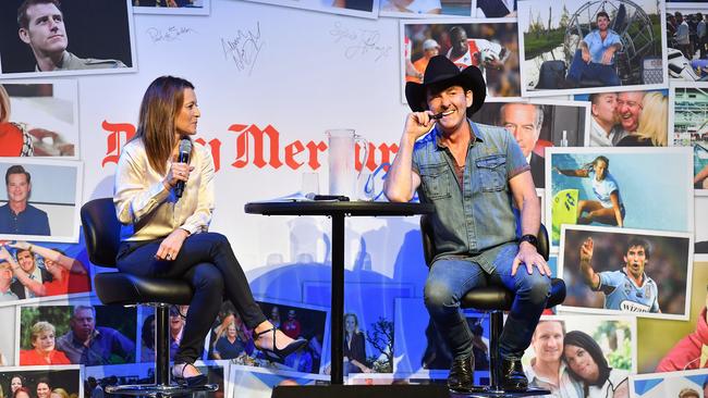 Sofie Formica chats with Lee Kernaghan on stage at the Mackay Club event. Picture: Tony Martin