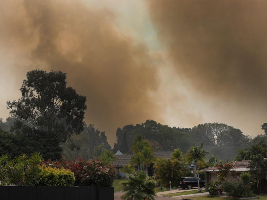 Grass Fires in the Carrara and Merrimac area kept Emergency Services and residents on alert during Tuesday. Picture Glenn Hampson