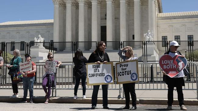 Protesters with abortion-rights and ant-abortion groups stand in front of the US Supreme Court Building before the senate’s procedural vote on making abortion legal throughout the US. The vote was lost. Picture: Getty Images/AFP