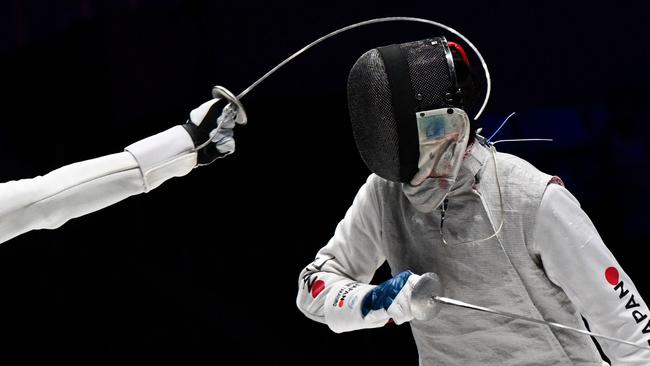 Hong Kong's Cheung Ka Long competes against Japan's Takahiro Shikine in the semi-final of the men's foil fencing during the Hangzhou 2022 Asian Games. Picture: Wang Zhao/AFP