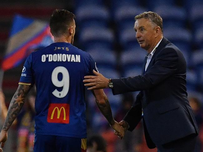 The Jets Roy O'Donovan shakes hands with coach Ernie Merrick following their Round 27 A-League match between the Newcastle Jets and Sydney FC at McDonald Jones Stadium, Newcastle, Saturday, April 27, 2019. (AAP Image/Dean Lewins) NO ARCHIVING, EDITORIAL USE ONLY