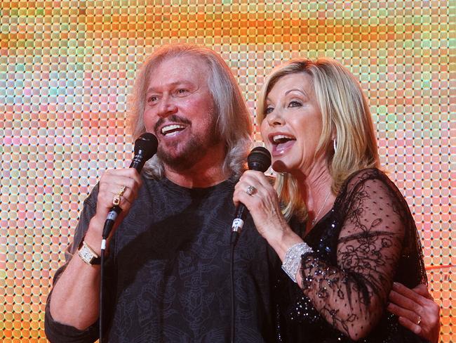 Barry Gibb and Olivia Newton John perform on stage during the Sound Relief concert at Sydney Cricket Ground on March 14, 2009 in Sydney. Picture: Mark Metcalfe/Getty Images