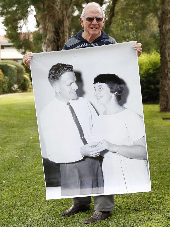 Mike Robinson with an engagement photograph. Photo: David Swift