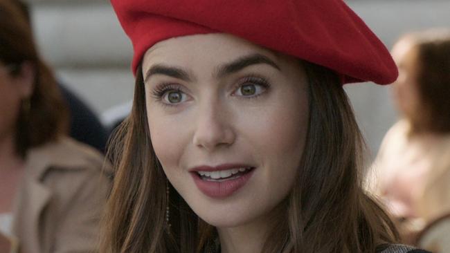 EMILY IN PARIS (L to R) LILY COLLINS as EMILY in episode 103 of EMILY IN PARIS. Cr. COURTESY OF NETFLIX Â© 2020