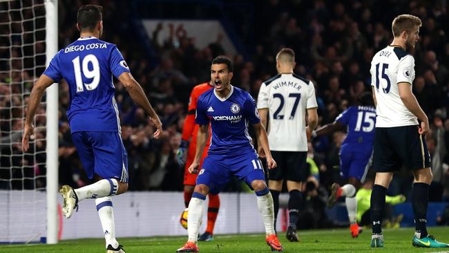 Pedro (C) of Chelsea celebrates scoring.