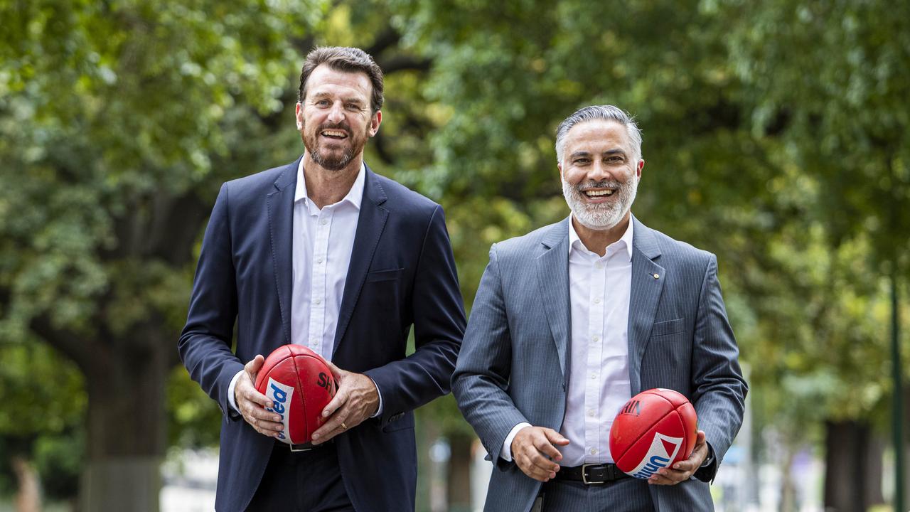 Ahmed Fahour (right) with Richmond FC CEO Brendan Gale after striking a sponsorship deal. Aaron Francis/The Australian