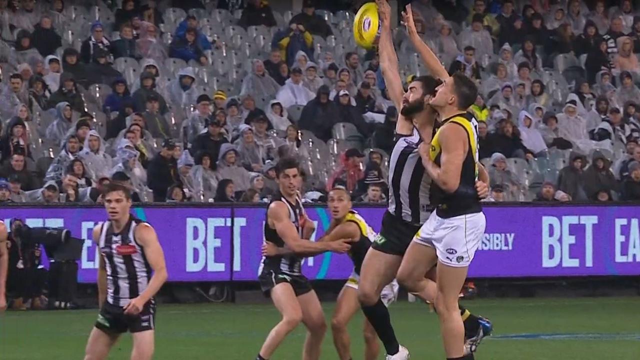 Brodie Grundy gave away a free kick in this ruck contest with Ivan Soldo.