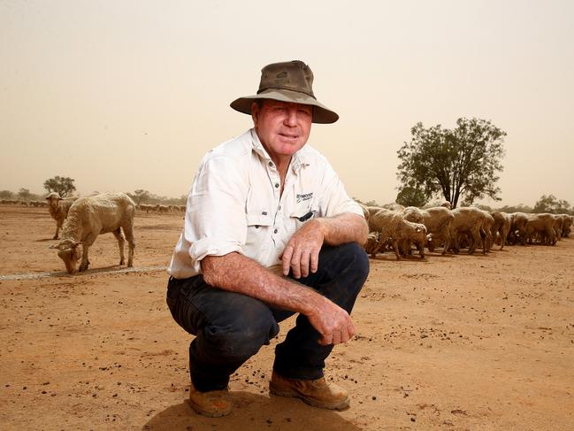 Michael Moody on his sheep farm, Abbadoah, near Cunnamulla where they have been hand feeding their sheep to keep them alive. Picture: Adam Head