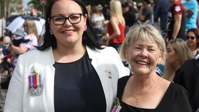 Jennifer Fonti (left) and Gail Kelly celebrate generations of family service to the nation at Cleveland's Anzac Day March 2019. Picture Andrea Macleod 