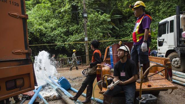 Water is pumped out of the caves. Picture:  AFP