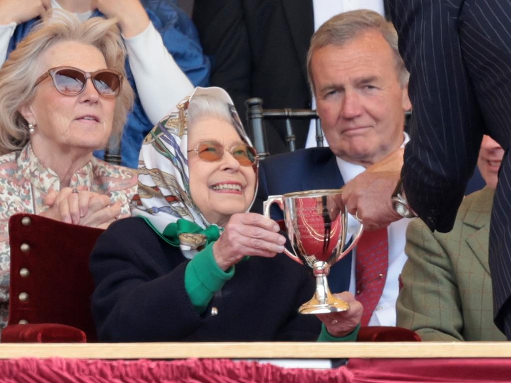 Queen Elizabeth II receives the winners cup at The Royal Windsor Horse Show at Home Park on May 13, 2022 in Windsor, England. Picture: Chris Jackson/Getty Images.