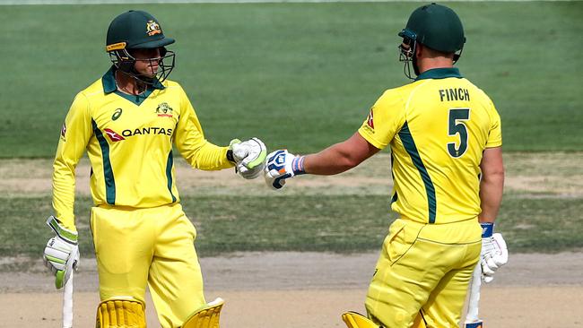 Usman Khawaja (left) and Aaron Finch could open the batting for Australia at the World Cup. Picture: AFP 