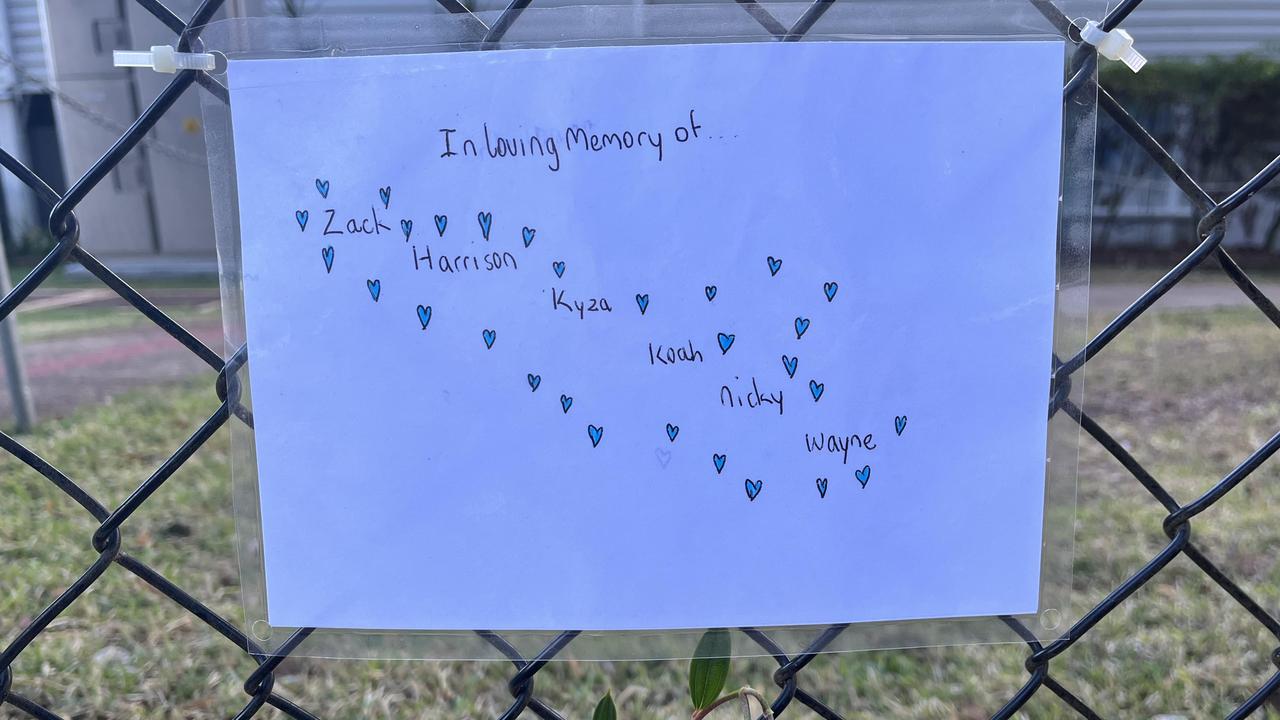 Tributes outside Russell Island State School for the children lost in the fire. Picture: Isabella Holland