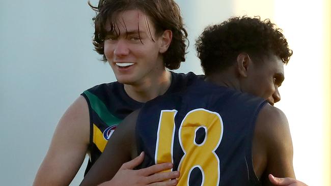 Munkara, pictured with fellow draft prospect Matthew Jefferson, doesn’t have a preferred foot. Picture: Kelly Defina/AFL Photos