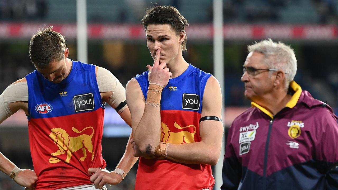 Eric Hipwood (centre) stands with Joe Daniher and Chris Fagan after the preliminary final loss to Geelong. Picture: Quinn Rooney