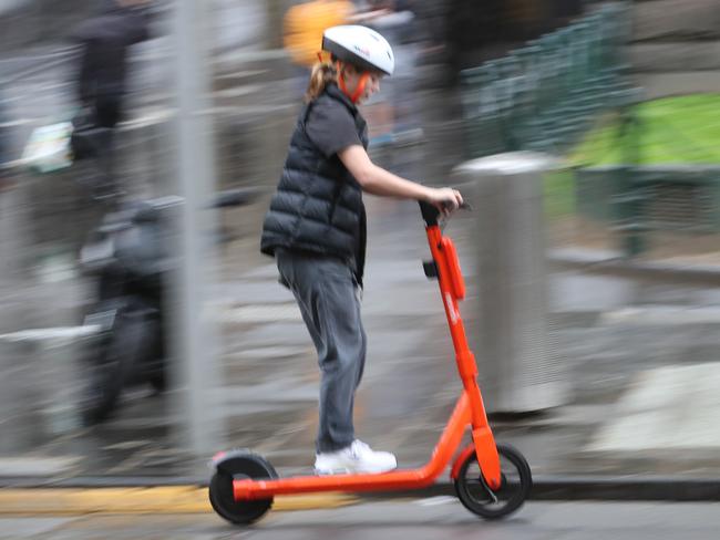 MELBOURNE, AUSTRALIA - NewsWire Photos, SEPTEMBER 26, 2022. Scooter riders in Melbourne CBD. Picture  : NCA NewsWire / David Crosling