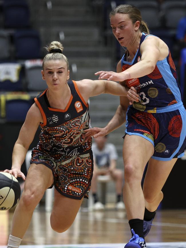 Steph Reid of the Fire competes for the ball with Abigail Wehrung of the Spirit during the round one WNBL match between Bendigo Spirit and Townsville Fire at Red Energy Arena, on November 04, 2023, in Bendigo, Australia. Picture: Martin Keep.