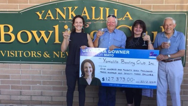 Georgina Downer with the novelty cheque at the Yankalilla Bowling club. Picture: Georgina Downer — Liberal for Mayo/Facebook