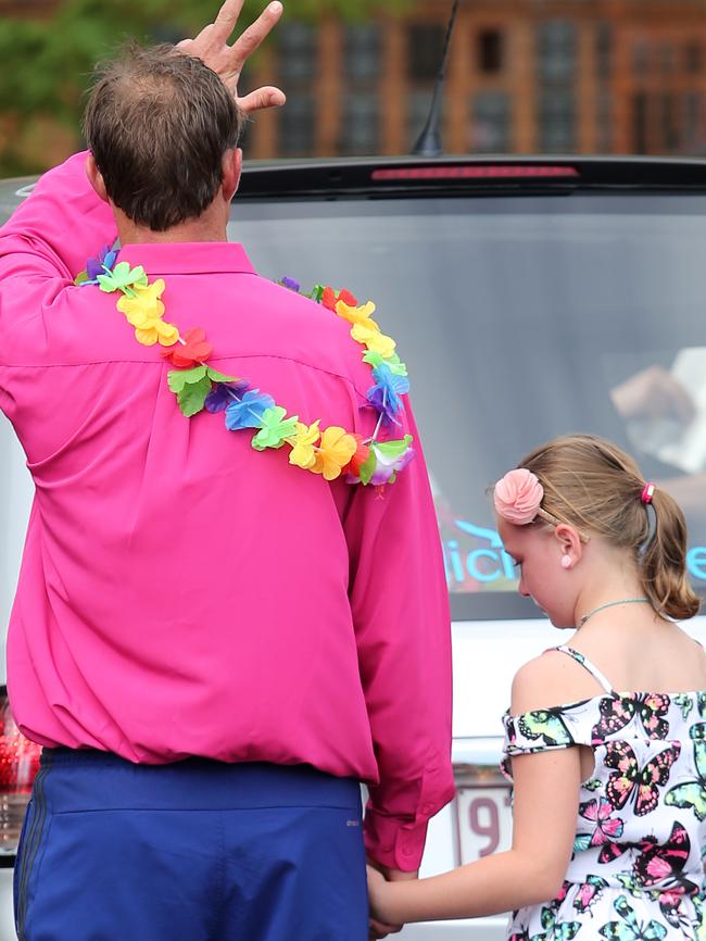 Blake Unsworth and his daughter at the funeral. Pictures: Jack Tran