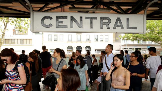 Commuters waited up to an hour for a train at Central Station. Picture: Jonathan Ng