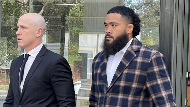 NRL Cronulla Sharks player Siosifa Talakai (right) with his lawyer leaving Sutherland Local Court. Picture: Ashleigh Tullis