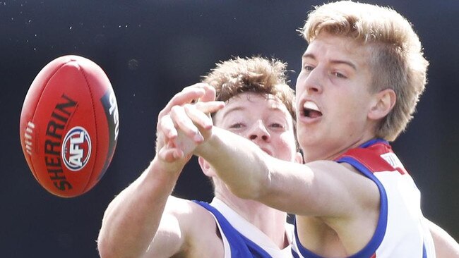 Nick Bryan (right) adds to Essendon’s ruck depth.