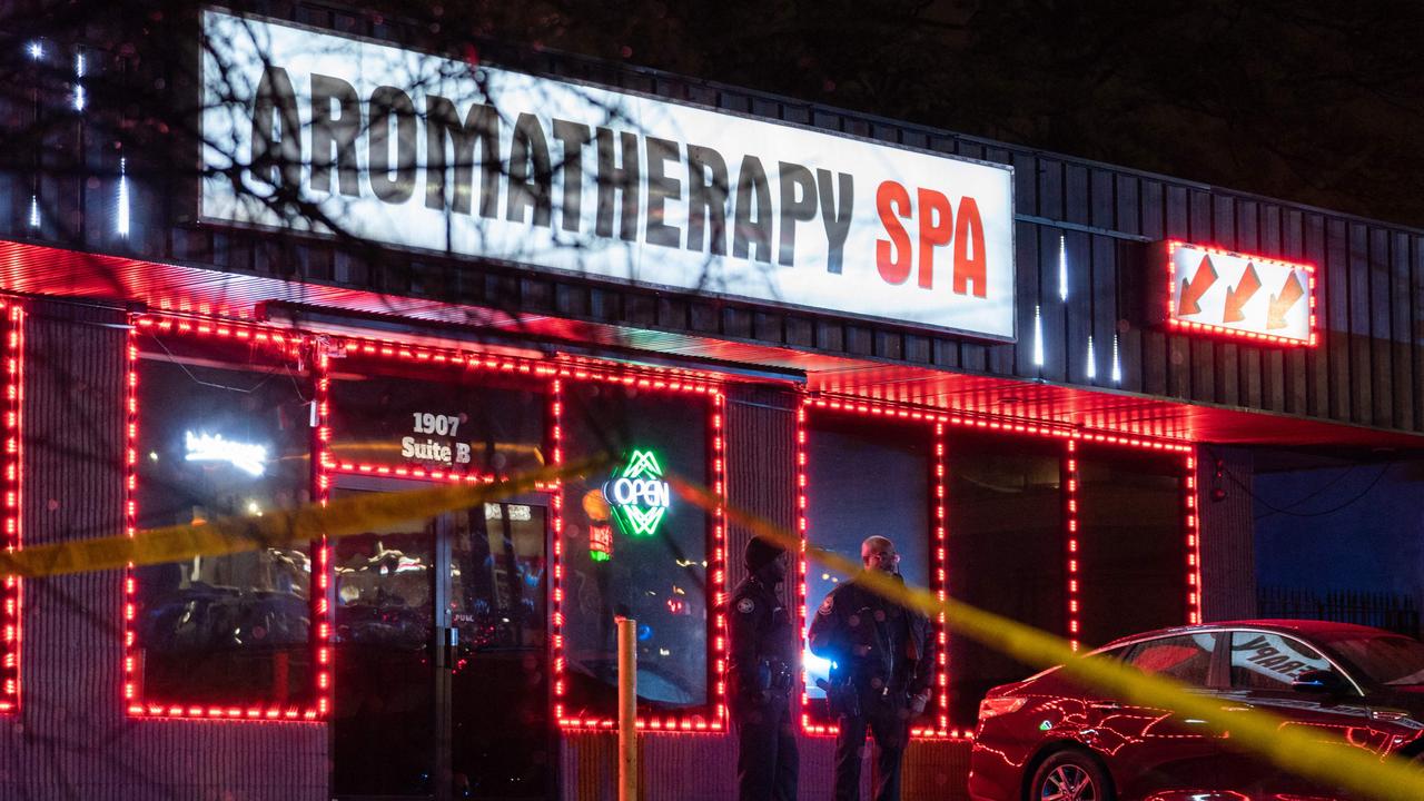 Law enforcement personnel are seen outside a massage parlour where a person was shot and killed in Atlanta, Georgia. Picture: Elijah Nouvelage/AFP