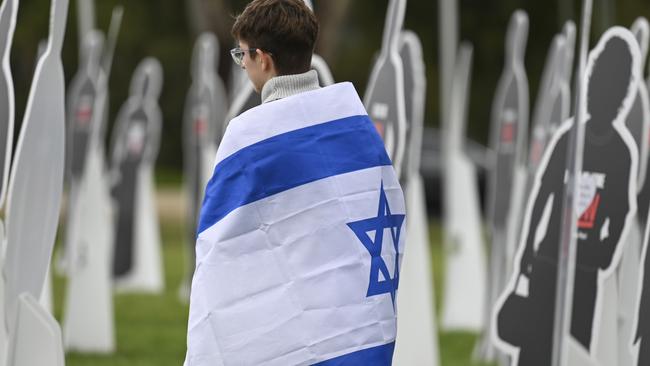 A family member or representative of Israelis who were kidnapped or murdered on October 7 in front of Parliament House last November. Picture: NewsWire/Martin Ollman